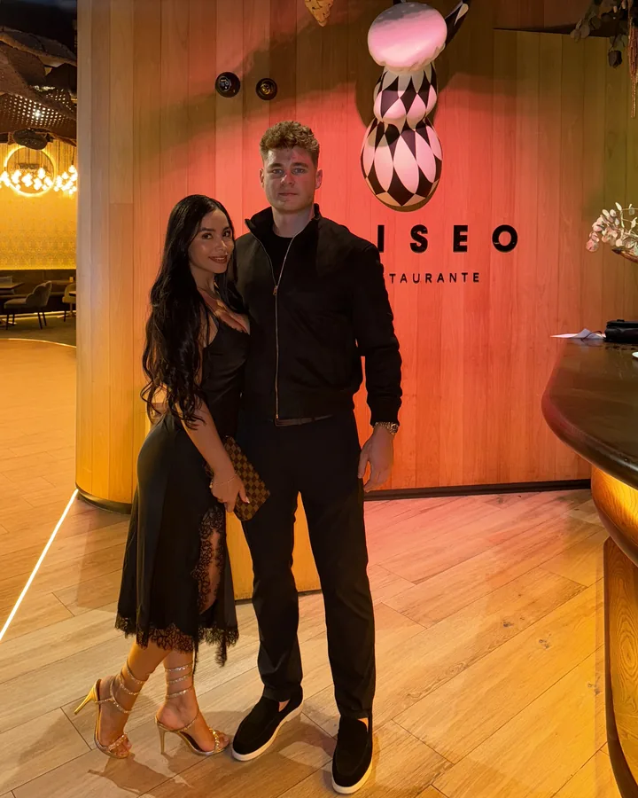 Arnas Gintalas and his wife at a restaurant